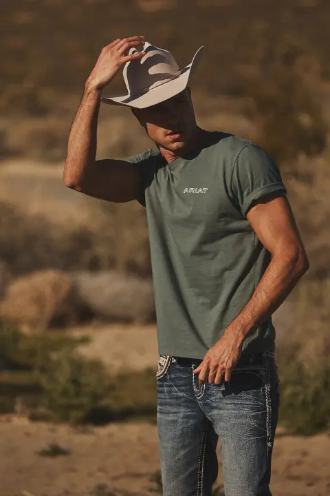 Man with Tshirt, Jeans, and Cowboy Hat